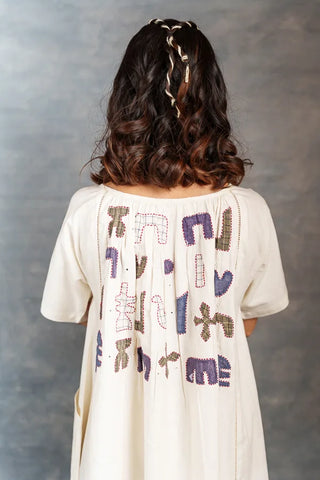 Eco angles dress- Playful applique with short sleeve asymmetrical style
